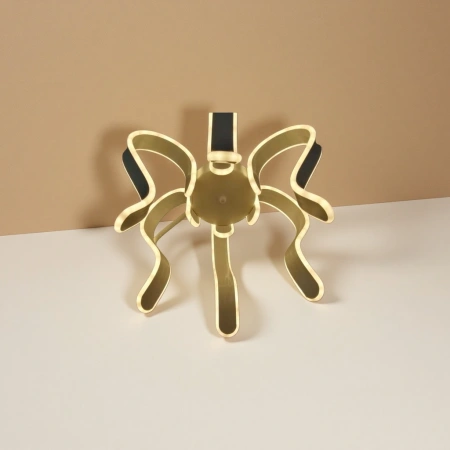 Golden bow-shaped chandelier, Nordic minimalist ceiling lamp for living room and bedroom Golden bow-shaped chandelier, Nordic minimalist ceiling lamp for living room and bedroom